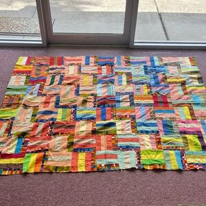 Colorful Hand Stitched Patchwork Quilt 76” x 64”
1960’s - 70’s Unfinished